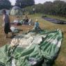 Arlo helping fold up tent